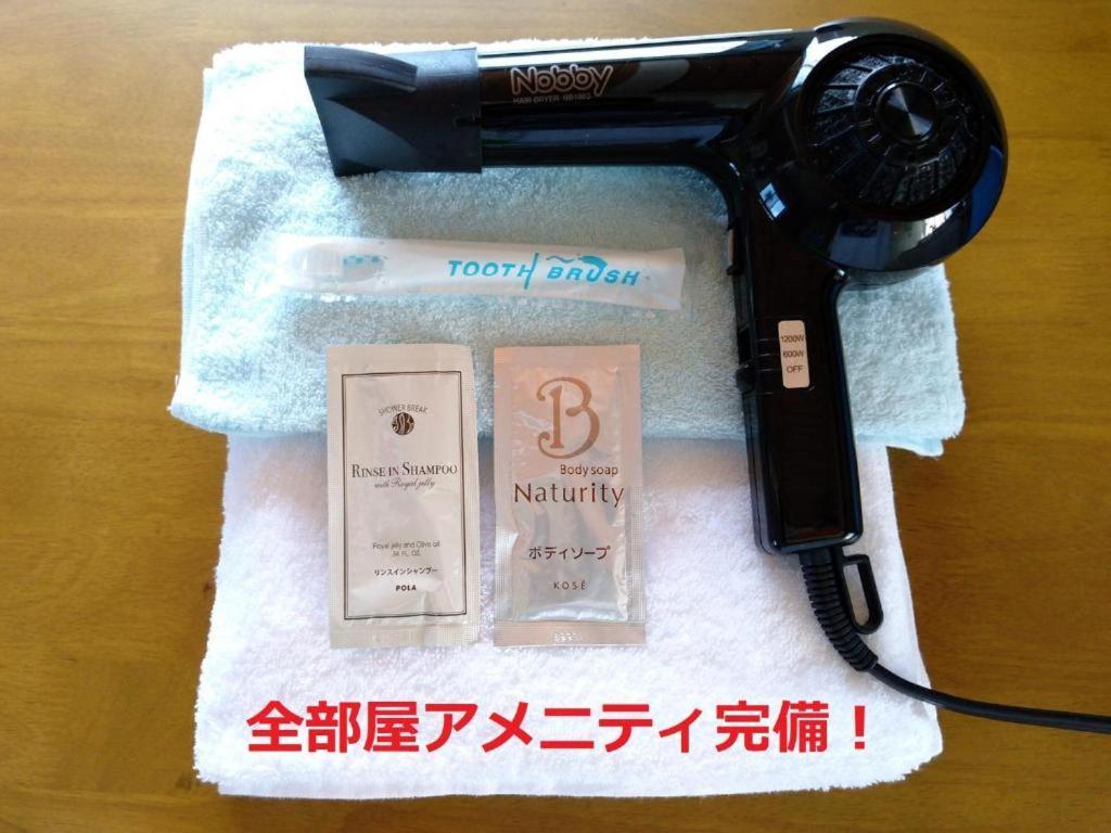 Tateyama Wheels Guest House Quarto foto